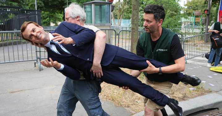 Activists steal Macron waxwork from French museum to highlight trade with Russia