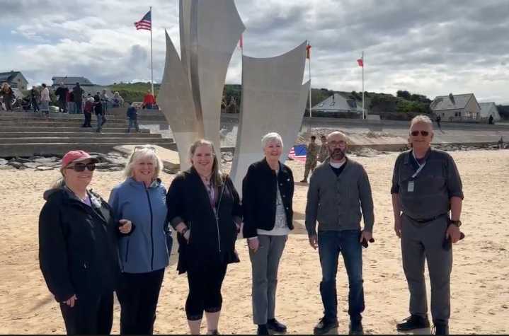 Bend singers, in France for D-Day ceremonies, perform ‘Star-Spangled Banner’ on the beach at Normandy