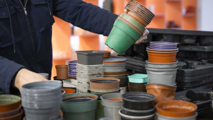 16 Clever Ways To Reuse Plastic Nursery Pots To Attract Birds & Pollinators (& Repel Unwanted Pests)