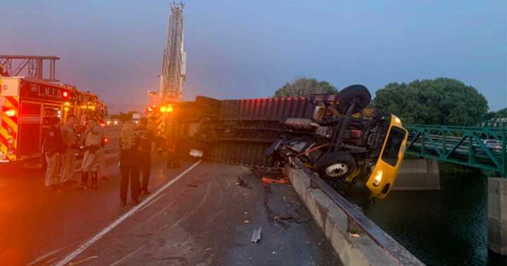 I-5 crash near Lathrop leaves box truck cab hanging over San Joaquin River