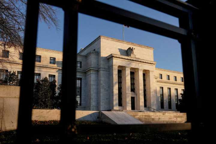 US economic activity declines as tariffs pressure prices, Fed says