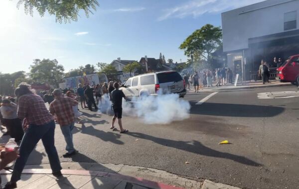 ICE raids grow tense as protesters confront immigration agents