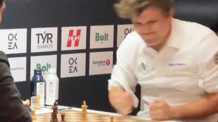 Fans 'can't stop watching' moment chess grandmaster loses his cool and slams table in disgust after conceding defeat