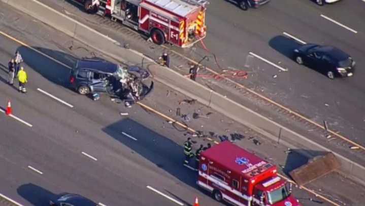 Crash sends large metal plates flying onto highway