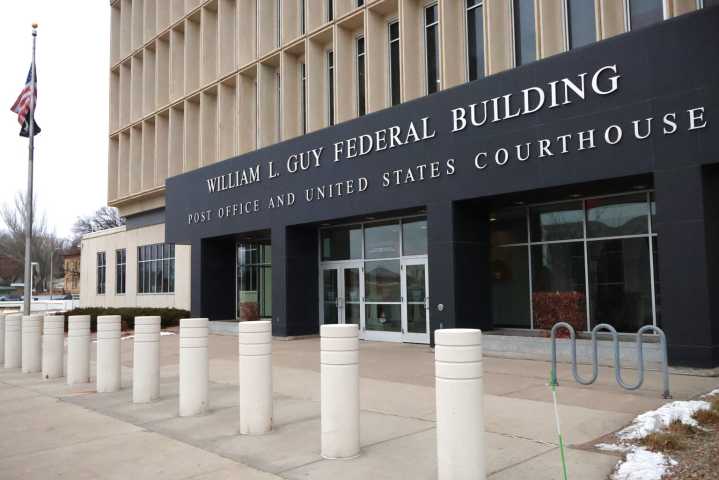 A judge tells federal agencies they can’t enforce anti-trans bias policies against Catholic groups