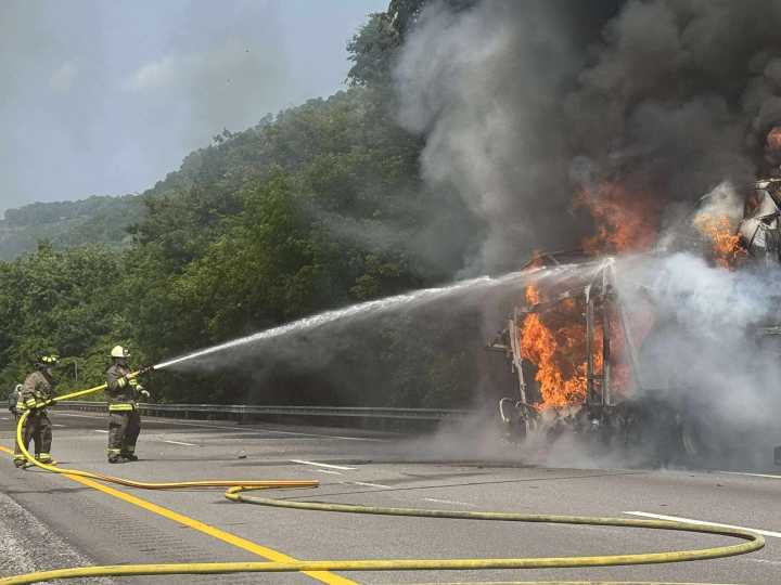 Crews respond to car hauler fire on I