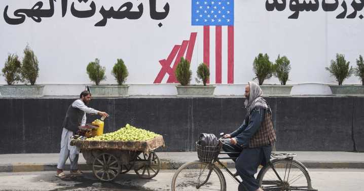 AP PHOTOS: Trump's expanded travel ban