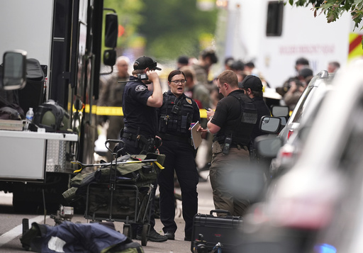 AP PHOTOS: FBI investigating 'targeted terror attack' at Pearl Street mall in Colorado