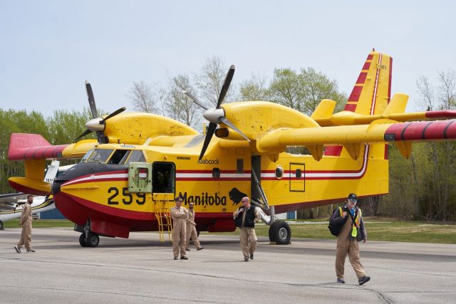 Saskatchewan lays charges in wildfires while 1,000 more flee in Manitoba