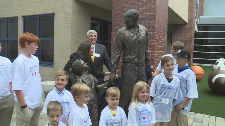 Peyton Manning statue unveiled at Ascension St. Vincent hospital campus