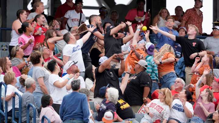 Texas vs Texas Tech softball in weather delay before NCAA WCWS Game 2