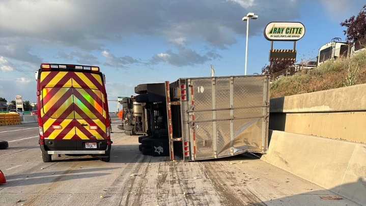 Car cutting off a semitruck causes rollover on I