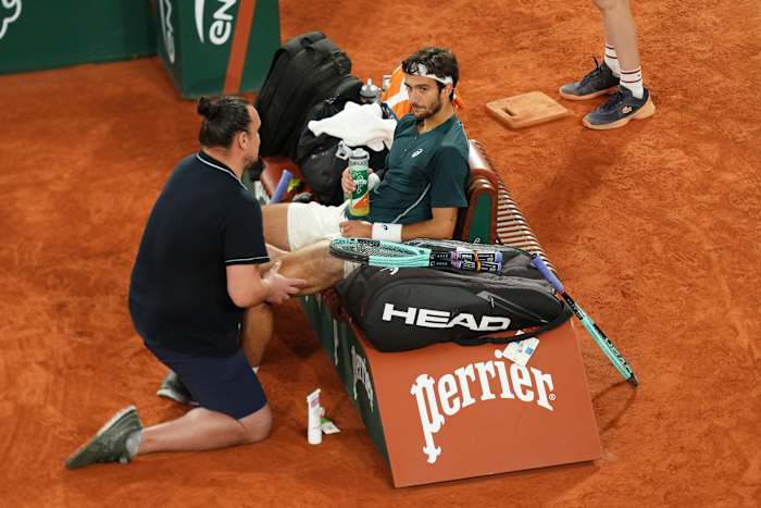 French Open: Carlos Alcaraz reaches final after Lorenzo Musetti retires with injury in fourth set