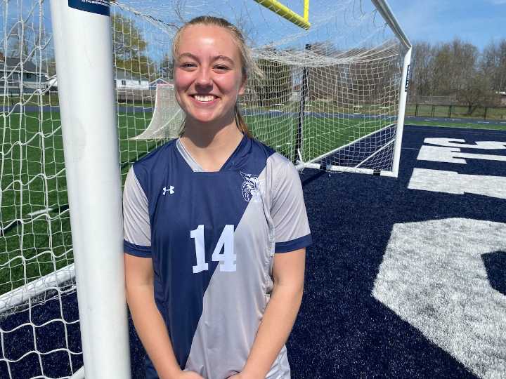 Fiona Meisel steps in at keeper and saves the day for John Glenn soccer