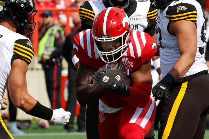 Calgary Stampeders top Hamilton Tiger-Cats 38-26 with three touchdowns from Dedrick Mills
