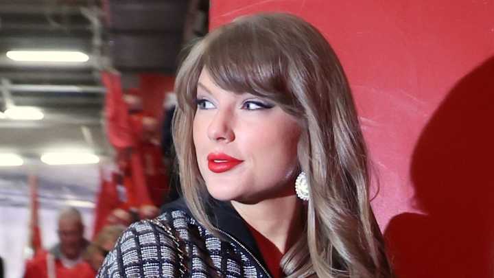 Taylor Swift is the ultimate wedding guest in floral gown alongside Travis Kelce