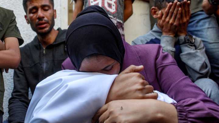 Israeli attacks on Gaza kill 34 people, including several near aid site