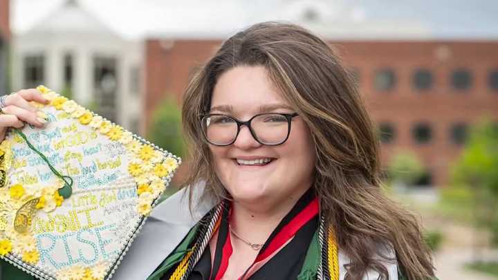 GMU grad overcomes paralysis to walk across stage