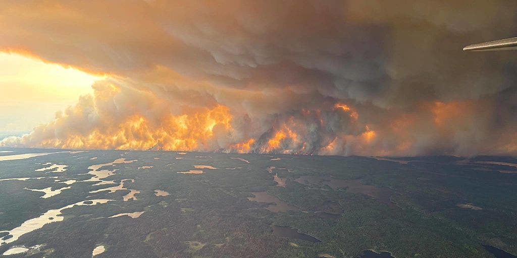 Canada wildfires shroud eastern US in orange, hazy skies
