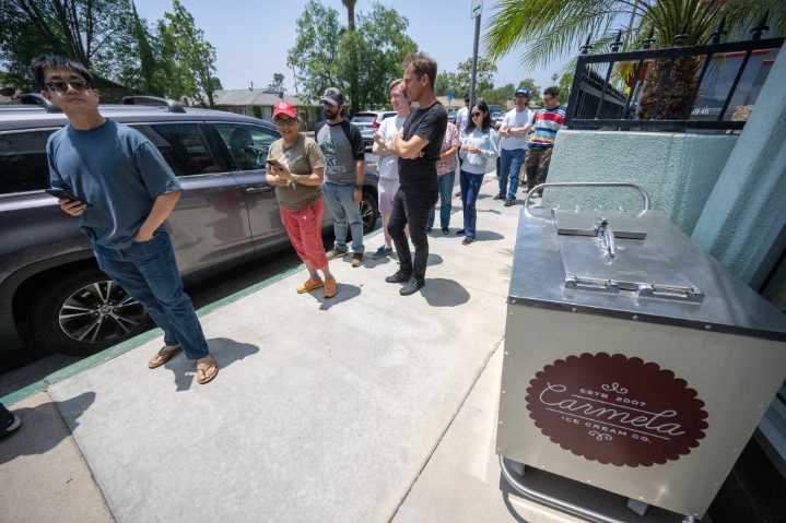 The re-opening of an Altadena ice cream shop brings smiles, topped with a scoop of hope