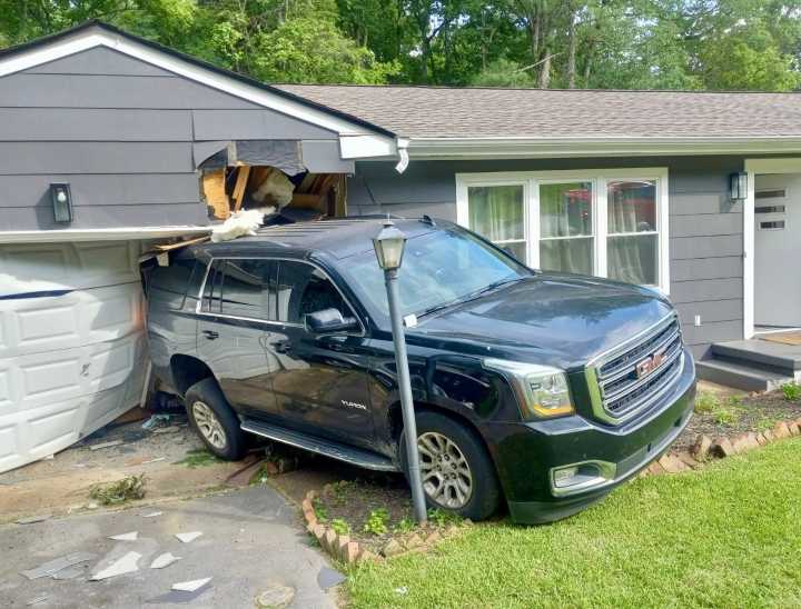 Car backs into Hixson home, no injuries reported