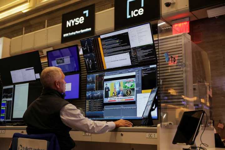 Wall Street futures edge up ahead of jobs data; Tesla rebounds