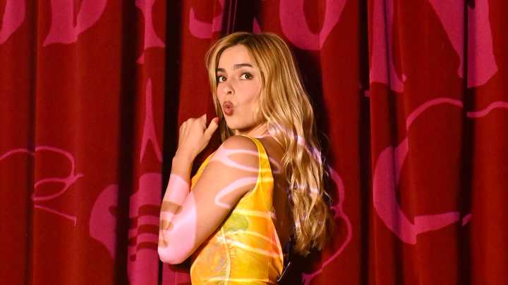 Addison Rae strips down to nude silk lingerie for burlesque performance at NYC club on album release day