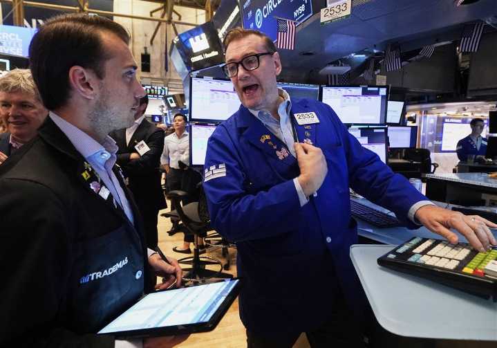 Wall Street gains ground following a solid jobs report