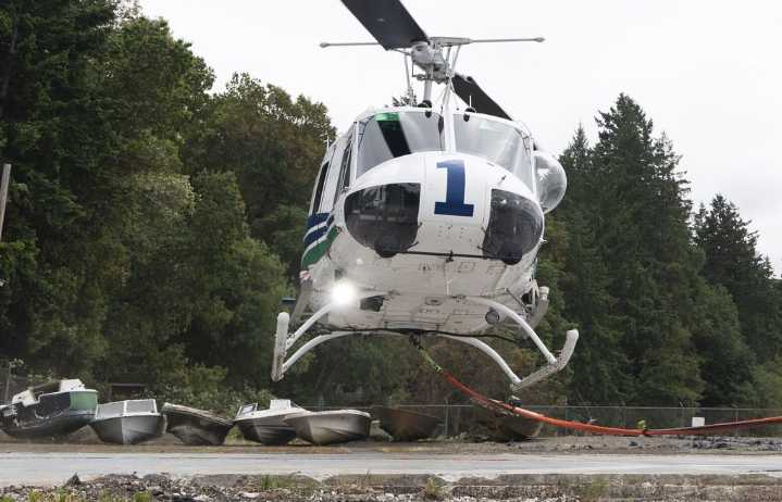 WA clears an island of derelict vessels near Olympia by helicopter