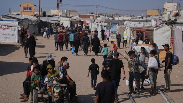 Palestinians say 5 killed by Israeli fire near aid sites. Israel says it fired warning shots