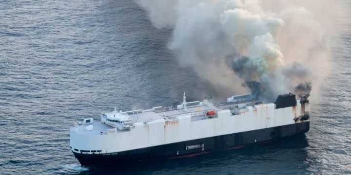Ship in North Pacific carrying 3,000 cars catches fire, forcing 22 crew members to be rescued from lifeboat