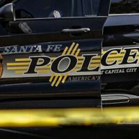 Unidentified man found dead in field off of St. Francis Drive