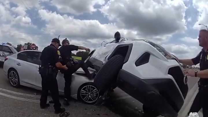 Video: Tampa police rescue child from vehicle crash