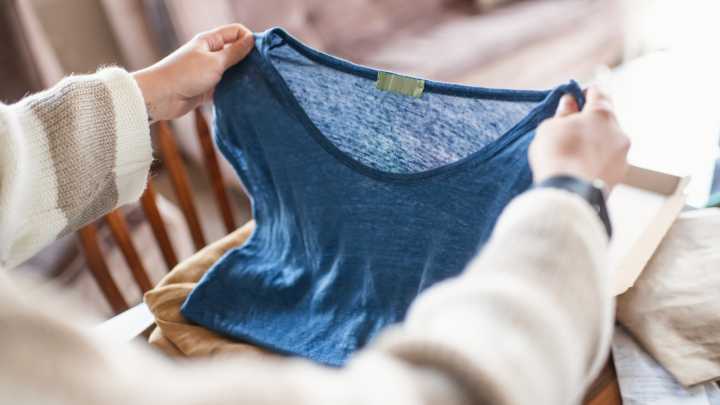Turn Old T-Shirts Into Sentimental Wall Decor With A Simple DIY