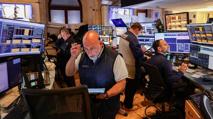 Wall Street Ticks Higher as Tech Boost Offsets Economic Worries