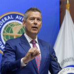 Transportation chief seeks to weaken fuel economy standards, calls Biden