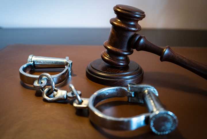 Mass. teacher arrested, accused of faking degrees and military history