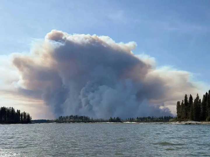 Crews battle wildfires with ‘garden hoses’