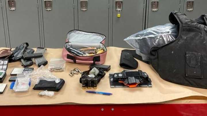Portland police arrest two, seize drugs and weapons in downtown raid
