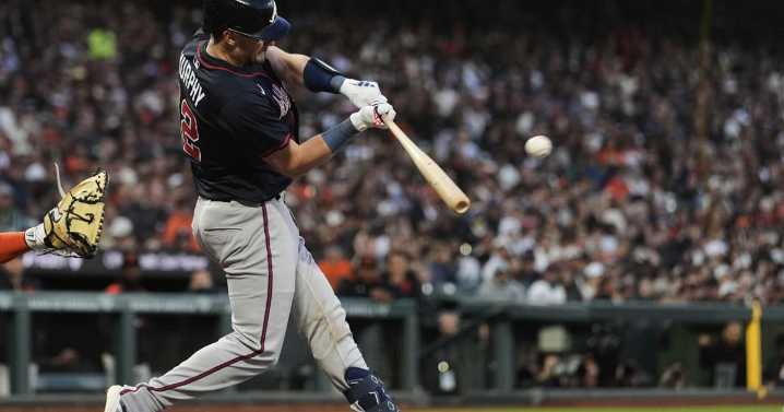 A ball thrown from the stands causes moment of confusion in Braves
