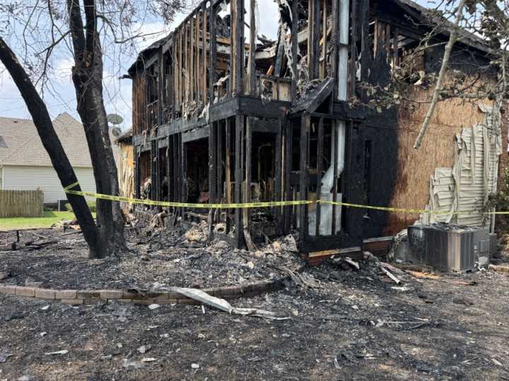 Woman hailed as hero for alerting couple to Spring Hill house fire, which caused 'catastrophic damage'
