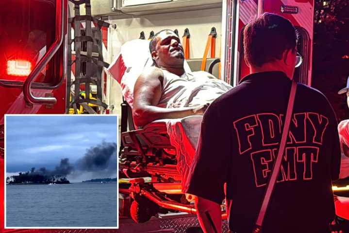 Rescuers rush to pull 22 victims from water after boat bursts into flames in Long Island Sound
