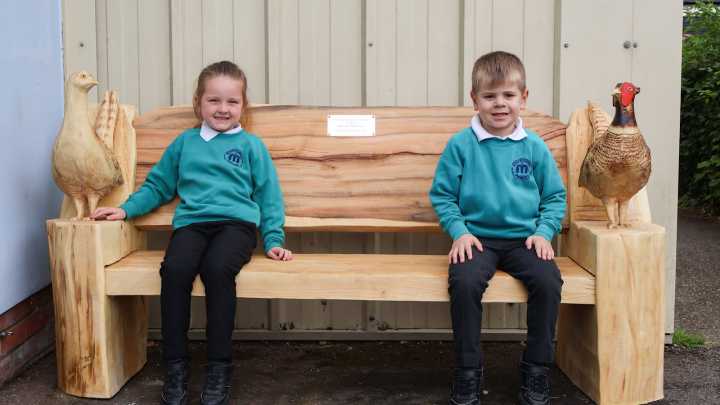 Schools given 'friendship benches' made from trees felled for A47 upgrade near Norwich