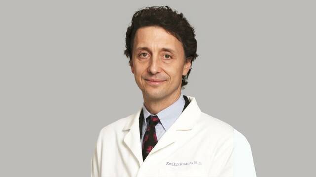 Dr. Roach: Doctor uses dictation machine during patient’s medical exam