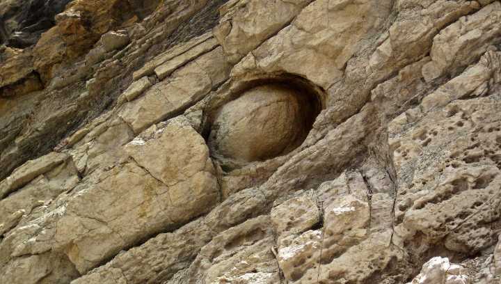 Cannonball Concretions: The Strange Geological Spheres That Are Borne Out Of Rockfaces