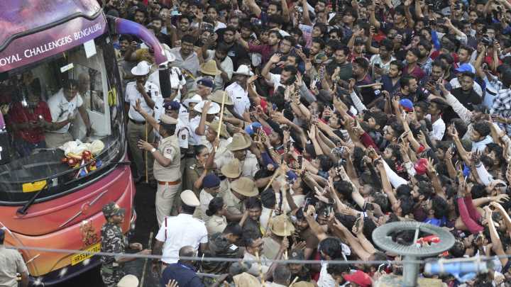 At least 11 people dead in stampede outside cricket stadium ahead of victory parade for IPL Champions