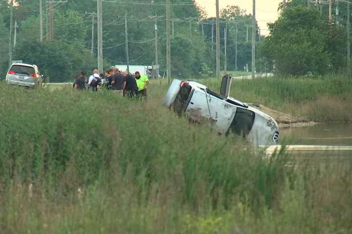 Woman, 27, and Toddler Die, 3 Others Rescued After SUV Crashes into Ohio Pond