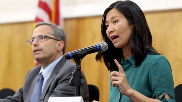 Accusations of election law violations fly back and forth between Wu and Kraft