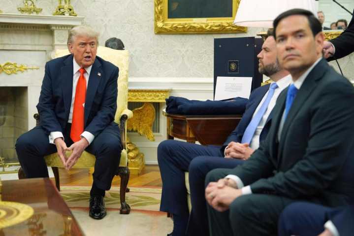 State Dept says current US visas from travel ban countries will not be revoked