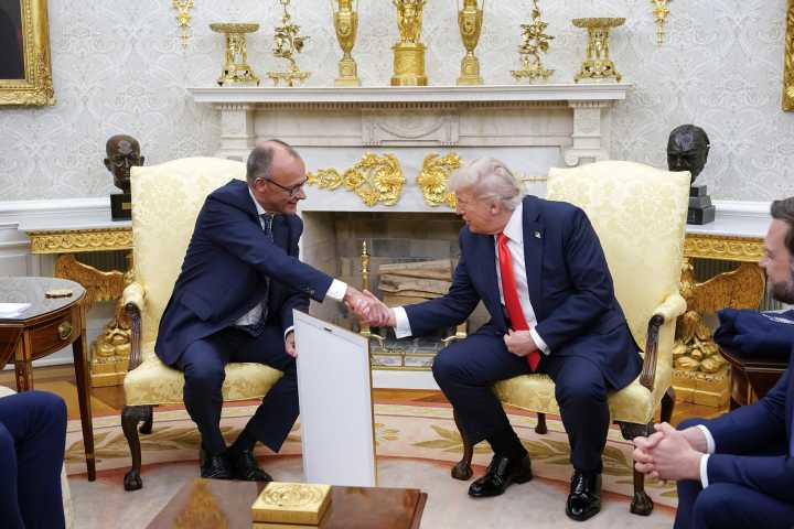 Germany's Merz avoids Oval Office ambush in first meeting with Trump